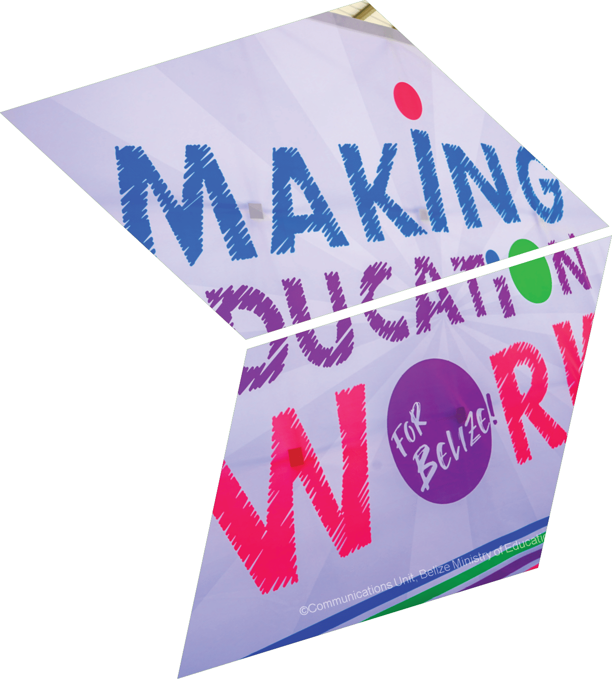 A large sign that says “Making Education Work for Belize". Description generated by AI