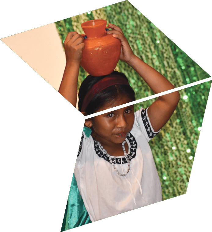 A girl holding a jug. Description generated by AI